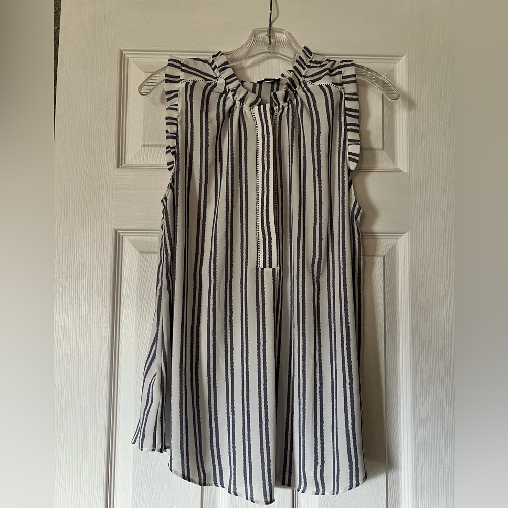 Ann Taylor flutter sleeve sleeveless blouse.